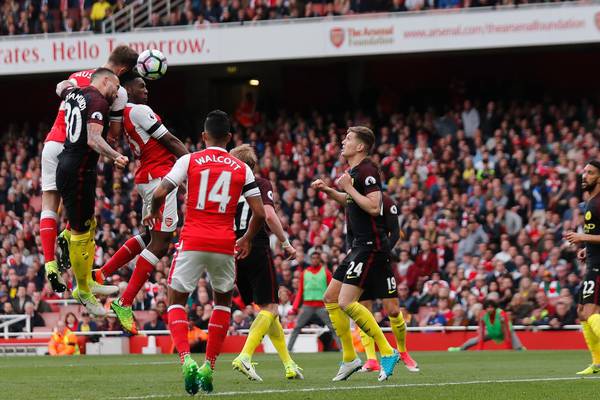 Arsenal and Man City share spoils as frenetic clash peters out