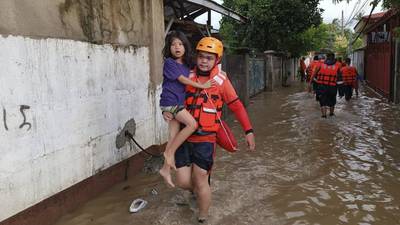 Storm Nalgae: At least 47 dead and dozens feared missing as flash floods hit Philippines