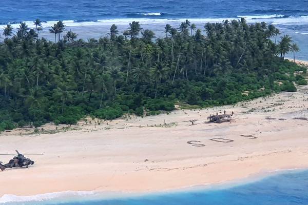 Missing sailors stranded on remote Pacific island saved by giant SOS in the sand
