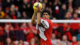 Gunners must not be distracted by Luis Suarez - Wenger