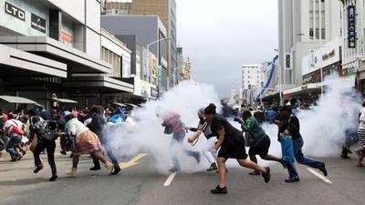 South African police use tear gas on anti-immigrant protesters
