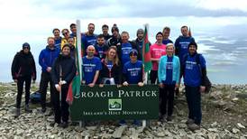 Wyse staff pay tribute to founder with Croagh Patrick climb