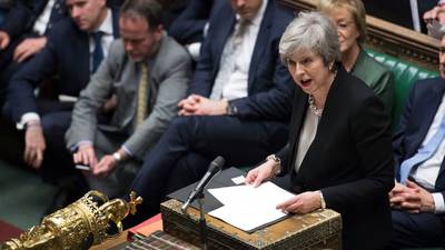 May pledges to reopen Brexit deal after victory in key vote