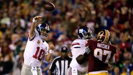 Manning picks off Redskins with Giant performance