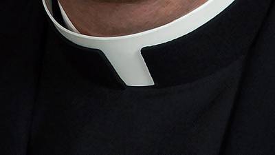 Priest seeks to halt trial on indecent assault charges