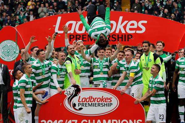 Champions Celtic beat Hearts to go a full season unbeaten