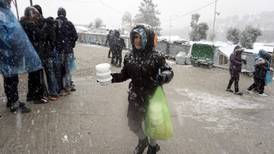 Refugees on Greek islands struggle in freezing temperatures