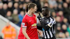 Jonny Evans pleads not guilty to FA spitting charge