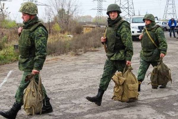 Shelling in eastern Ukraine casts doubt on key troop withdrawal