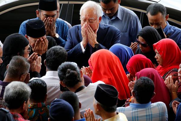 Najib recasts himself as man of the people as trial begins