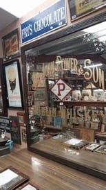 Rare advertising signs, framed mirrors and bar stools at pub memorabilia sale 