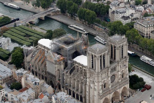 Work on Notre Dame halted and schools shut as toxic  lead found near stricken monument