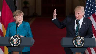 Trump stands by wiretap claims in  tense meeting with Merkel
