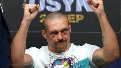 New heavyweight king Usyk wears his crown – and his bruises – lightly