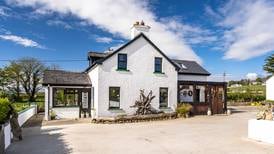 Quaint Donegal period home at the edge of Lough Foyle with eco glamping business for €365,000
