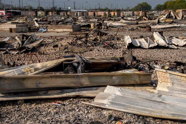 Hundreds missing after migrant camp fire in France