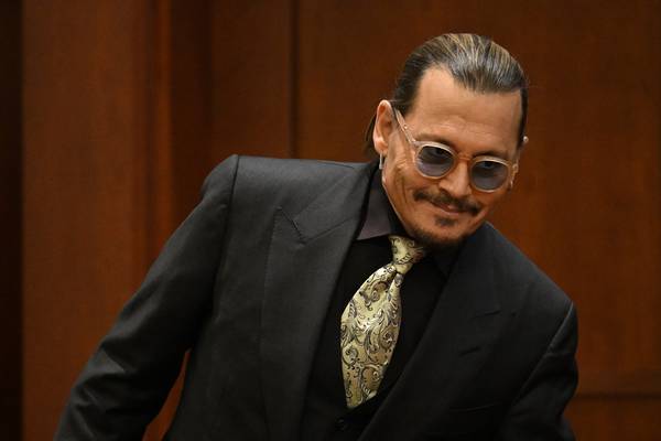 Johnny Depp tells US court of never striking ex-wife Amber Heard
