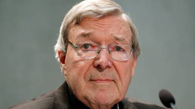Cardinal Pell arrives in Australia to face sexual offence charges