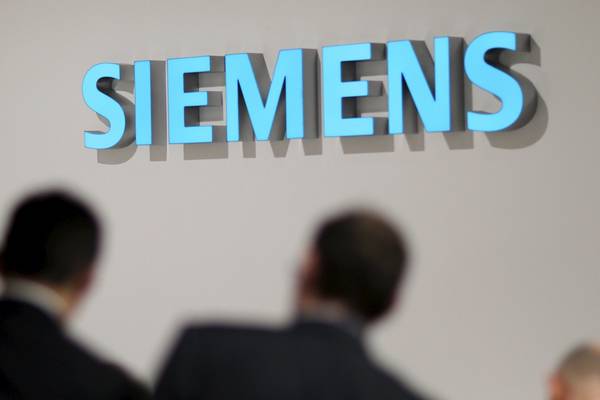 Siemens steps up cost-saving programme to tackle downturn