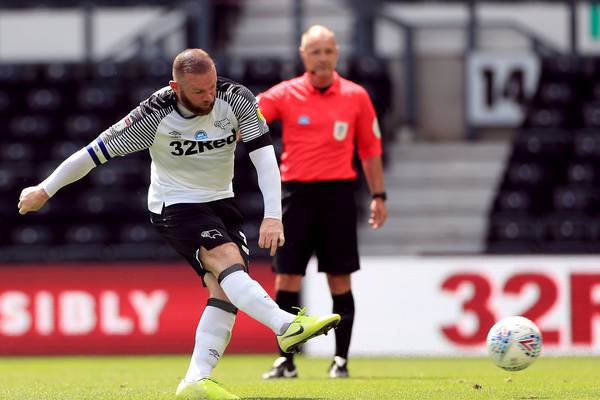 Wayne Rooney’s penalty sees Derby County past Reading