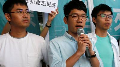 Hong Kong democracy activists walk free from court