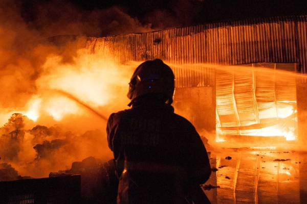Rathcoole blaze largely extinguished as fire brigade to remain overnight