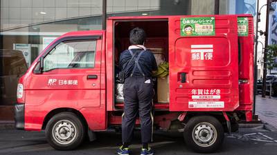 Japan Post firms make bumper debut after $12bn triple IPO