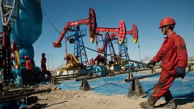 Oil prices fall to five-year low as supply glut continues