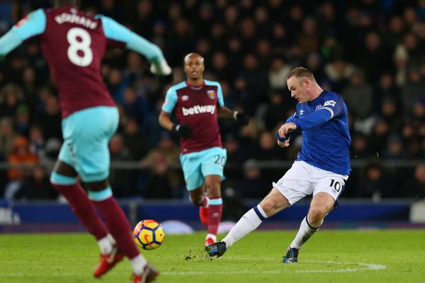 Wayne Rooney strikes from the halfway line as Everton crush West Ham
