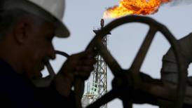 Brent oil slides to 11-year lows on glut concerns