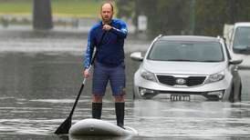Australia floods: More than 85,000 people on evacuation alert as torrential rain eases