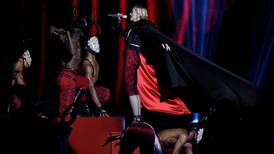 Madonna dragged off Brits stage ... by her own cloak