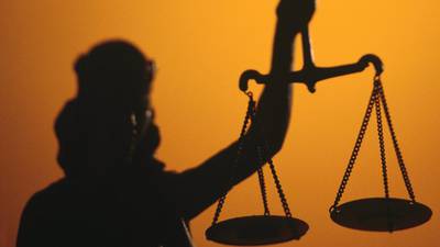 Woman sues retired garda over alleged rape