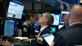 Falling euro boosts European shares, as Wall Street makes gains