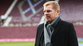 Neil Lennon hit by coin during tempestuous Edinburgh derby