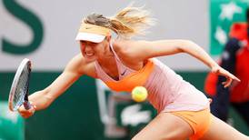 Sharapova moves into French Open semi-finals