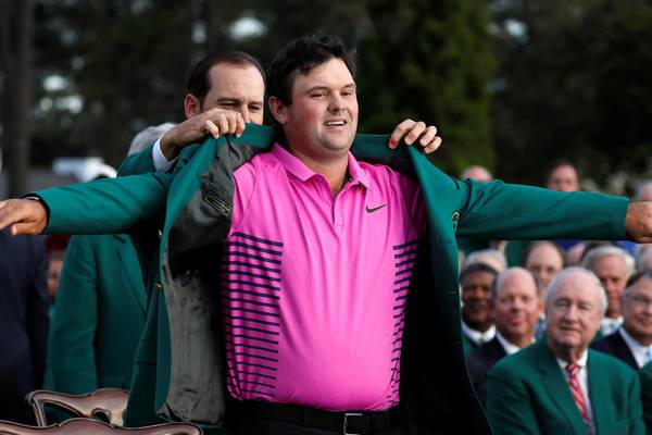 ‘Captain America’ Patrick Reed swaps cape for green jacket