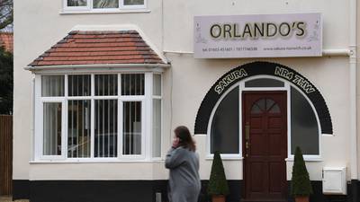 Man denies running restaurant from home despite sign over door