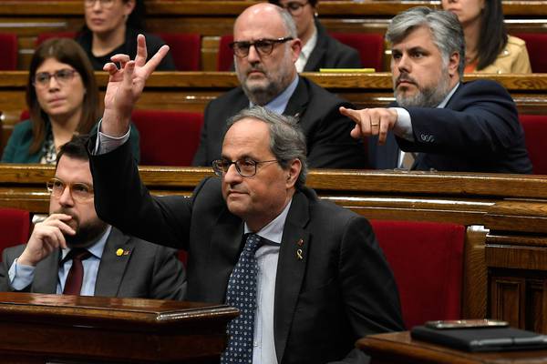 Catalan parliament strips president Torra of seat