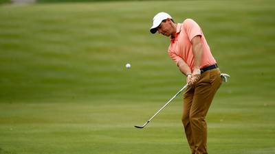Rory McIlroy lurking dangerously after marathon day at Firestone