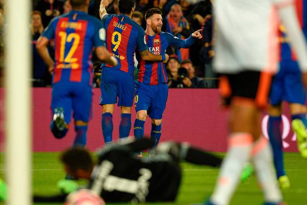Messi bags a brace as 10-man Valencia make Barca sweat