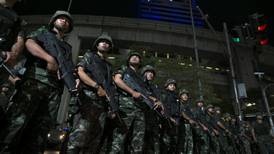 Shinawatra one of 100 leaders summoned in Thai coup