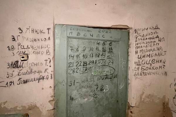Trapped in a basement by Russian soldiers, one woman began writing the names of the dead on a wall 