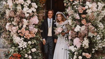 Britain’s Princess Beatrice marries in dress and tiara borrowed from queen