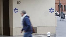 French prosecutors investigate foreign link to Star of David graffiti