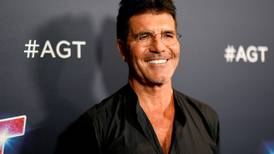 Simon Cowell in surgery after breaking back falling off bike
