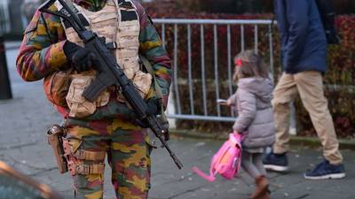 Schools and metro reopen in Brussels amid tight security
