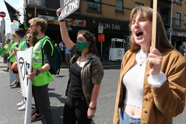 Environmental activists stop the traffic in Dublin