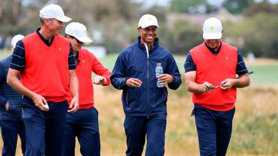 Tiger Woods drops the game face to soak up Australian affection