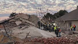 South Africa building collapse: Rescuers make contact with 11 survivors trapped in rubble